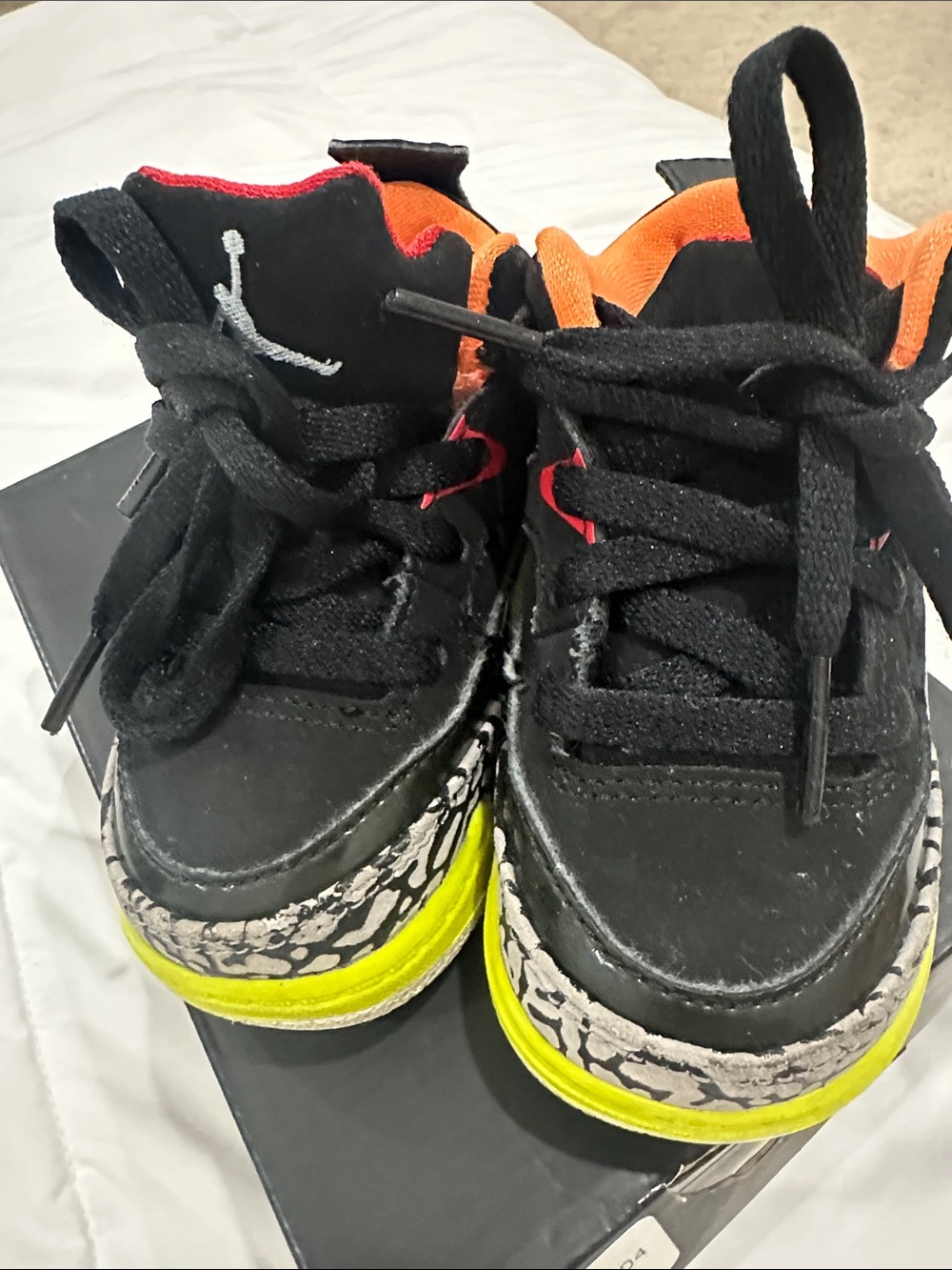 Kids Black and Orange Basketball Shoes with Neon Yellow Trim